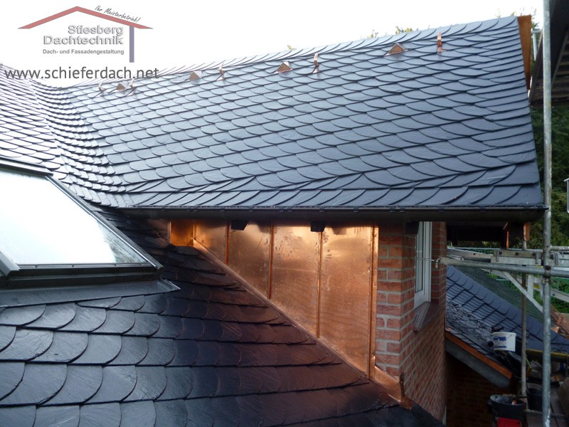 slate roof of a large family home